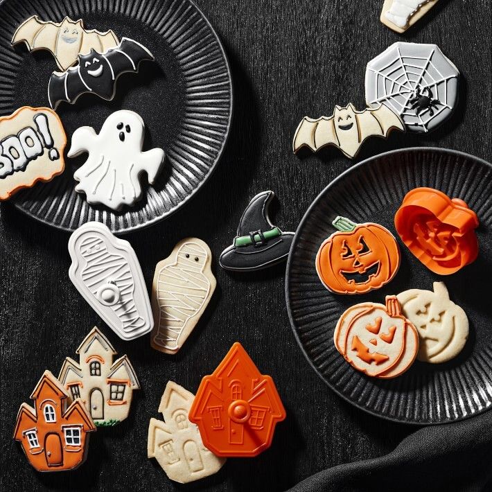 A set of 8 Halloween cookie cutters with supplies