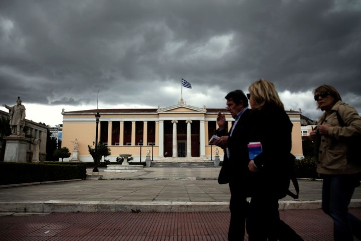 People make their way past the Athens' University, Greece, May 5, 2016. REUTERS/Alkis Konstantinidis 