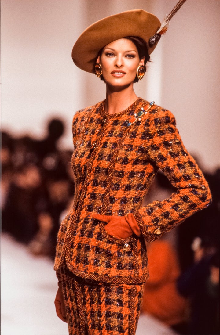 Linda Evangelista poses on the runway during a 1992 fashion show in Paris.