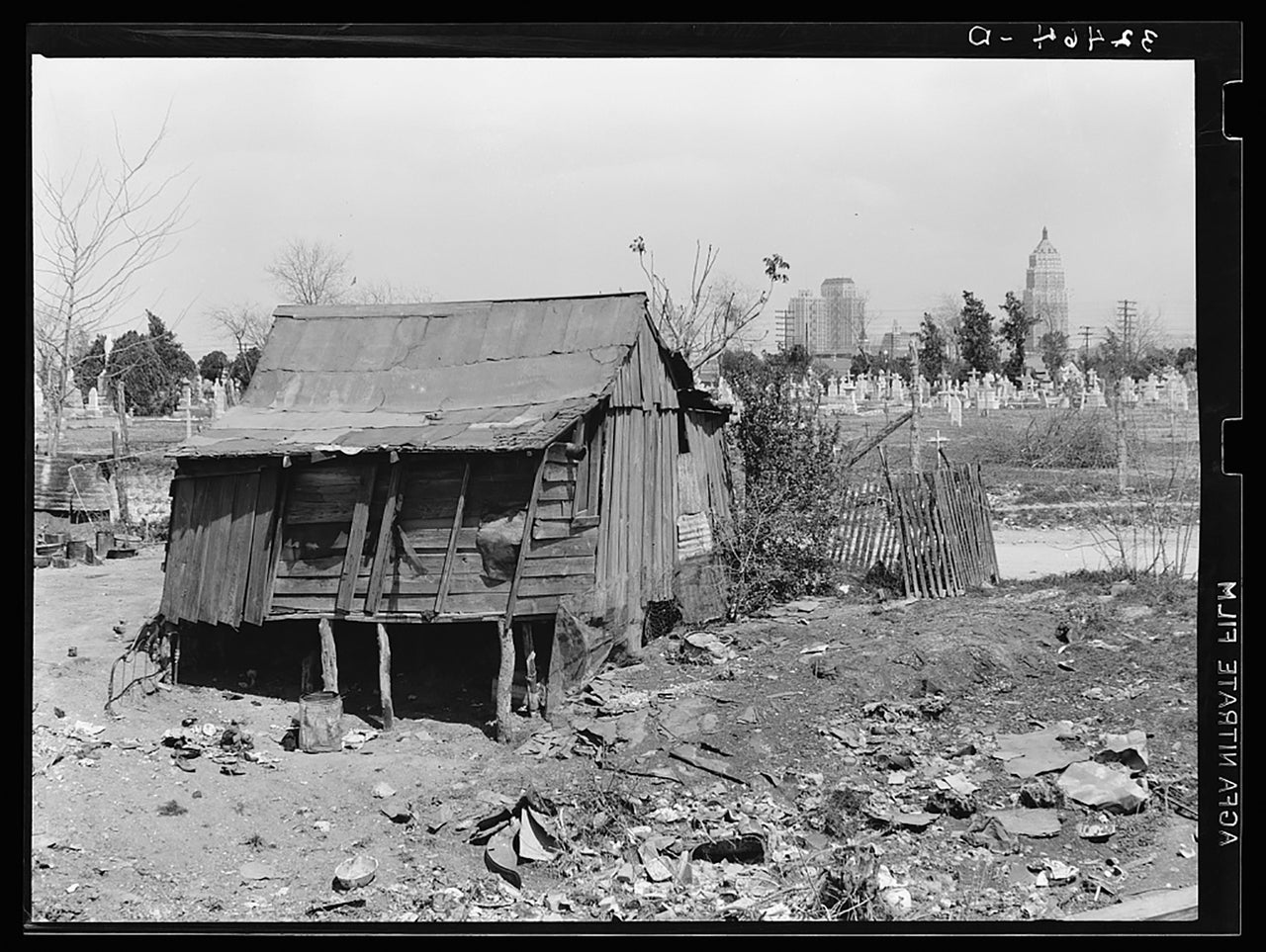 The type of the simple wooden homes Latinos on the west side of the city lived in. Many were instantly destroyed when the waters came.