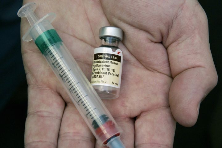 A doctor holds a vial of the human papillomavirus (HPV) vaccine Gardasil. HPV can cause cervical cancer in girls later in life.