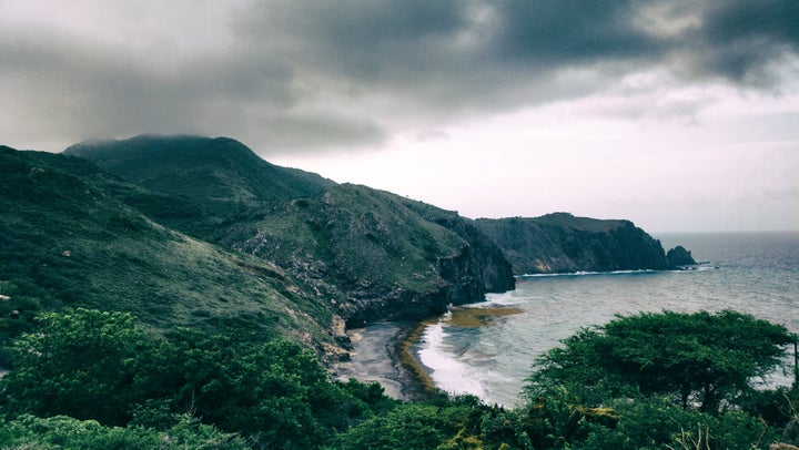 Wild black sand beach in Montserrat, 2014.