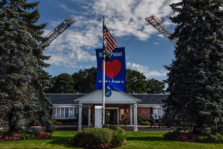 Mourners gather at a funeral home to pay respects to Gabby Petito on Sunday in Holbrook, New York.