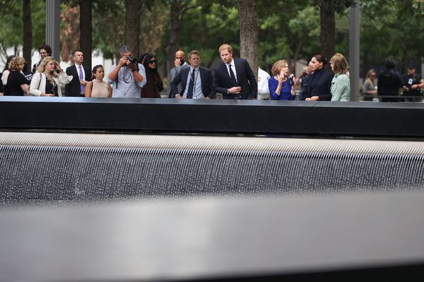 Harry and Meghan observe the sites of the 9/11 Memorial.