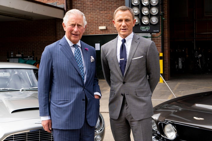 Charles poses with Daniel Craig as he tours the set of the 25th James Bond film at Pinewood Studios on June 20, 2019, in Iver Heath, England.