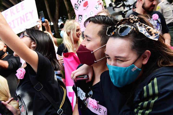 #FreeBritney activists react during a hearing in which Spears' father, Jamie Spears, was removed by a judge as conservator of her estate at the Stanley Mosk Courthouse on September 29, 2021 in Los Angeles, California. 