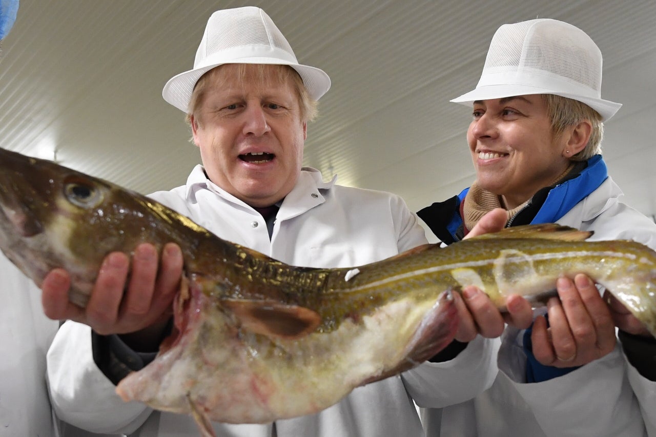 Prime Minister Boris Johnson on a visit to Grimsby Fish Market.