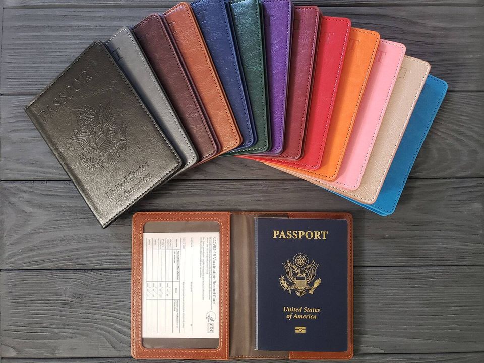 A clamshell-style passport and vaccine card holder