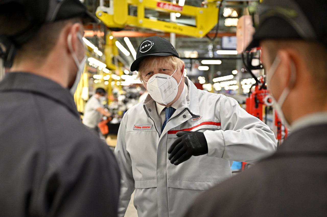 Johnson in his personalised "Prime Minister" Nissan jacket.