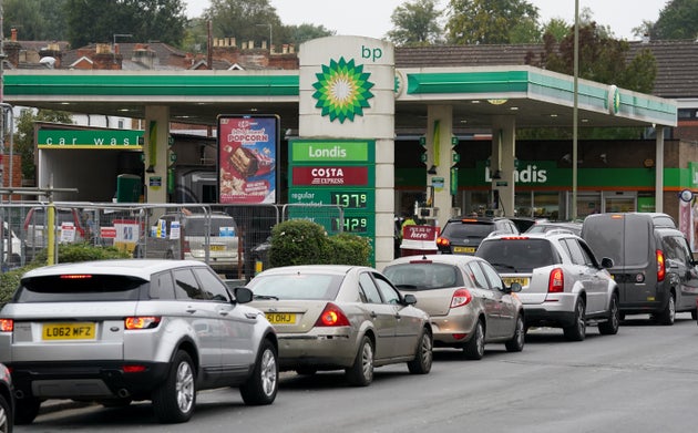 Vehicles queue up outside a BP petrol station in Alton,