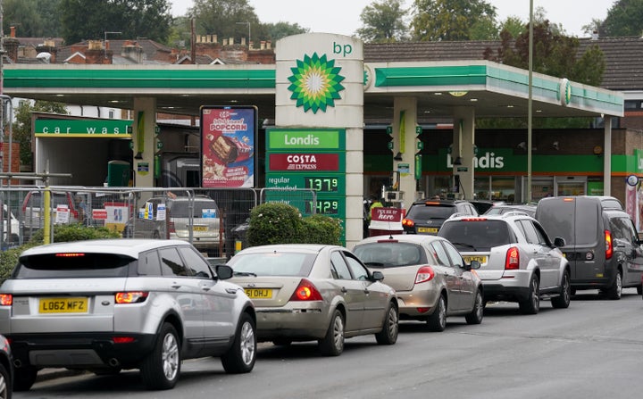 Vehicles queue up outside a BP petrol station in Alton, Hampshire.