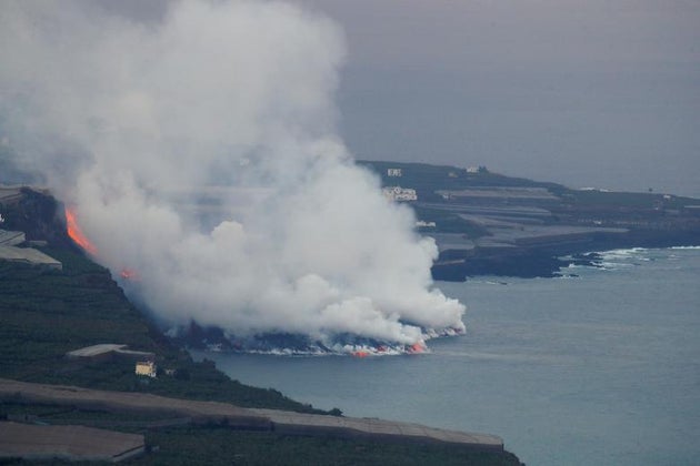 Lava flows into the sea, as seen from Tijarafe, following the eruption of a volcano on the Canary Island...