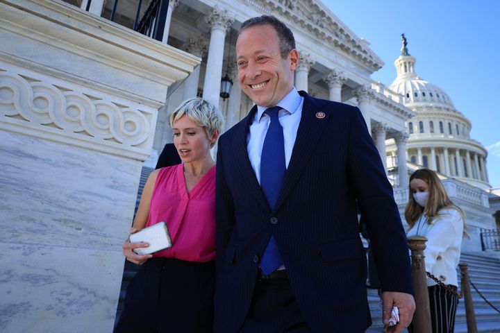 Problem Solvers Caucus Co-Chair Rep. Josh Gottheimer (D-N.J.) is pursued by a group of reporters as he leaves the U.S. Capitol.