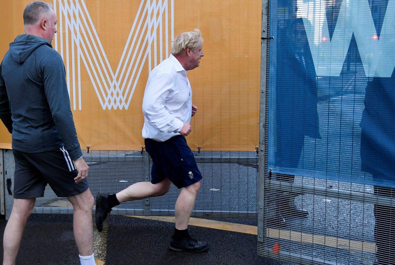 Boris Johnson jogs in the morning before the annual Conservative Party conference in Manchester