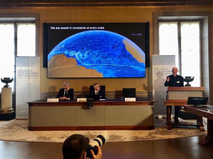 John Wettlaufer, right, Nobel Committee expert, speaks at the announcement of the Nobel Prize in Physics.
