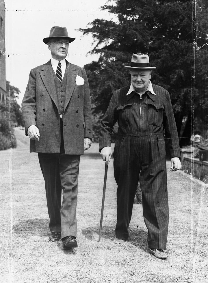 Churchill walks with the American financier and Presidential advisor Bernard Baruch on the grounds of his Kent home in July 1949.