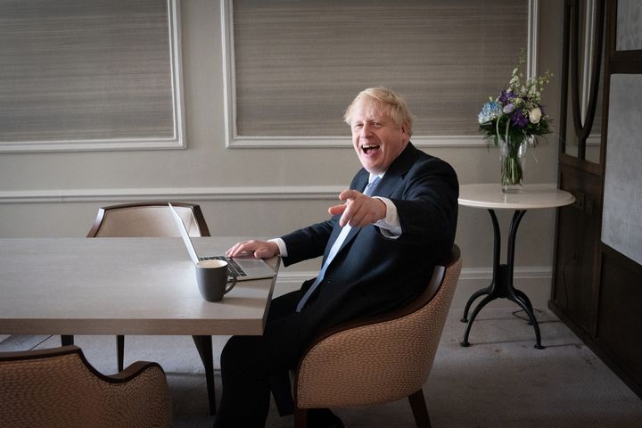 Boris Johnson prepares his keynote speech in his hotel room in Manchester before addressing the Conservative Party Conference on Wednesday.