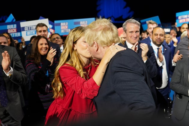 Carrie Johnson greets her husband before his leader's