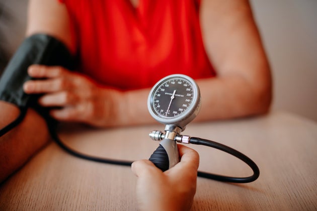 Old people checking blood pressure