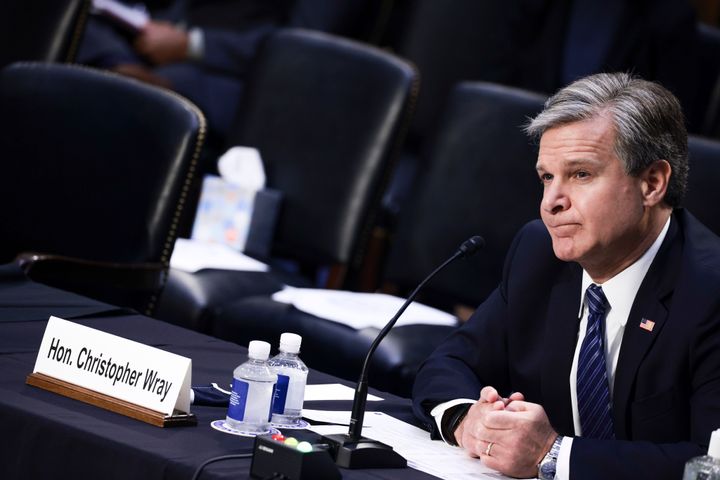 FBI Director Christopher Wray listens during a Senate Judiciary hearing about the inspector general's report on the FBI mishandling of the Larry Nassar investigation on Sept. 15.