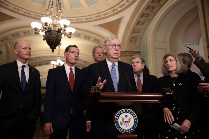 Senate Minority Leader Mitch McConnell (R-Ky.) addresses reporters following a weekly Republican policy luncheon Tuesday. McConnell reiterated his belief that the Senate should pass legislation to raise the federal debt limit through a process called reconciliation.
