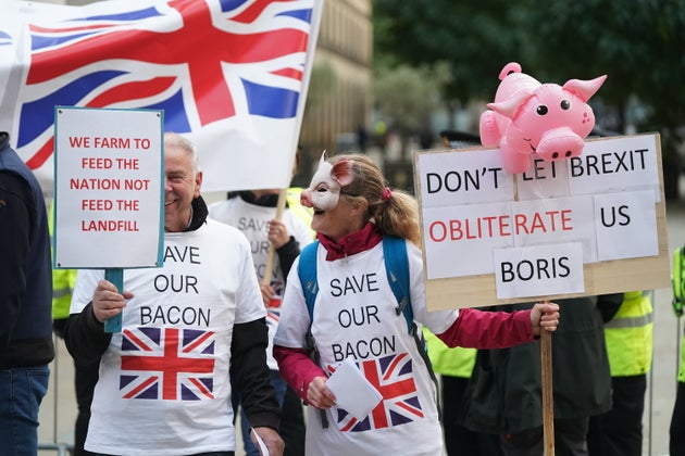 Pig farmers protesting outside the Conservative Party Conference in Manchester this