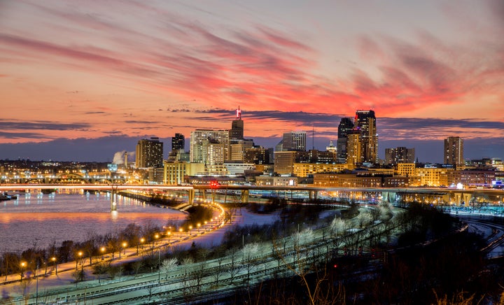 Authorities described the scene in downtown St. Paul as "hellish," with gunshot victims found lying in the street, on the sidewalk and inside the bar.