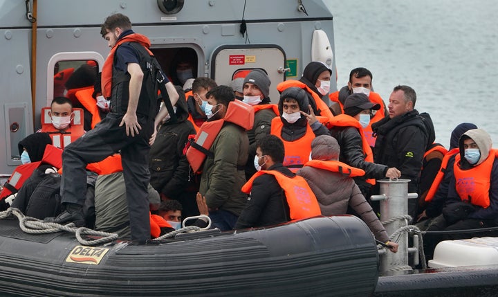 A group of people thought to be migrants are brought in to Dover, Kent, onboard a Border Force vessel following a small boat incident in the Channel