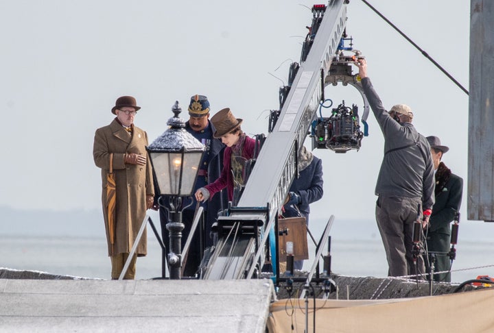 Timothée Chalamet is seen as Willy Wonka during the filming of the upcoming movie 'Wonka' by Warner Bros.  and Roald Dahl Story Co on October 11 in Lyme Regis, England.  This film focuses on the young Willy Wonka on his earliest adventure and how he met the Oompa-Loompas.