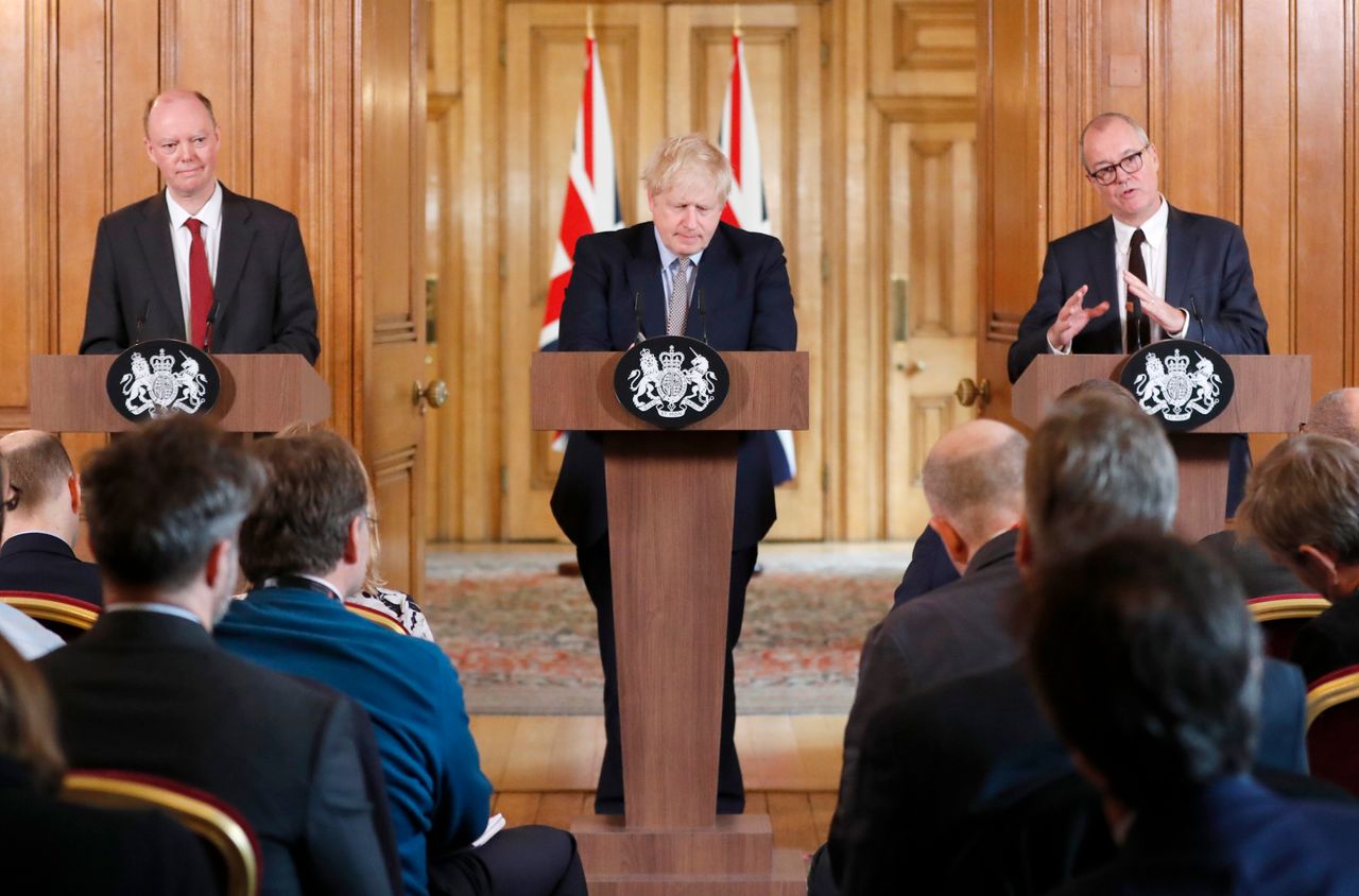 Prime minister Boris Johnson flanked by the UK's chief medical adviser Chris Whitty (left) and the chief scientific adviser Patrick Vallance on March 3, 2020.