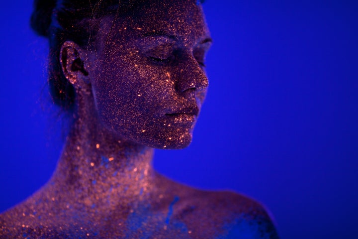 Woman Portrait Painted With Uv Makeup Color High-Res Stock Photo - Getty  Images