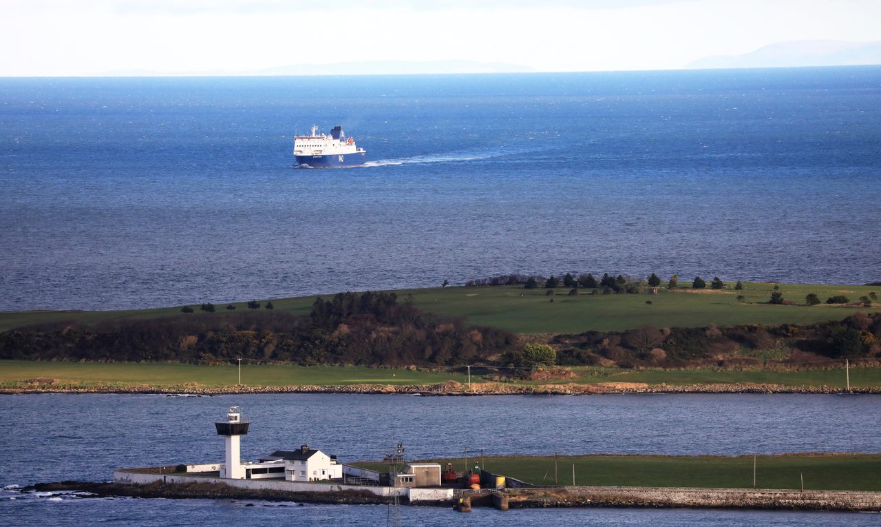 A ferry from Scotland crosses the Irish Sea making way towards the port at Larne on the north coast of Northern Ireland.