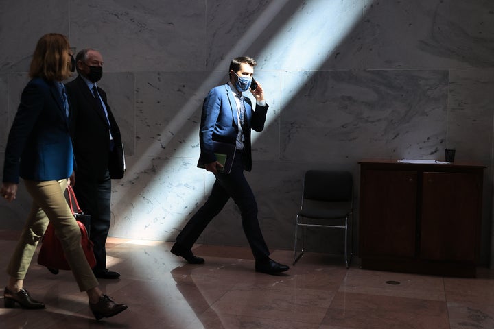 White House Legislative Affairs Director Louisa Terrell, Counselor to the President Steve Ricchetti and National Economic Council Director Brian Deese leave a meeting with Sen. Kyrsten Sinema (D-Ariz.) in the Hart Senate Office Building on Capitol Hill in Washington, D.C., on Sept. 29.