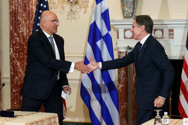 U.S. Secretary of State Antony Blinken and Greece’s Foreign Minister Nikos Dendias shake hands after signing the renewal of the U.S.-Greece Mutual Defense Cooperation Agreement at the State Department in Washington, U.S. October 14, 2021. REUTERS/Jonathan Ernst