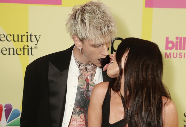 Machine Gun Kelly and Megan Fox arrive at the 2021 Billboard Music Awards in May.