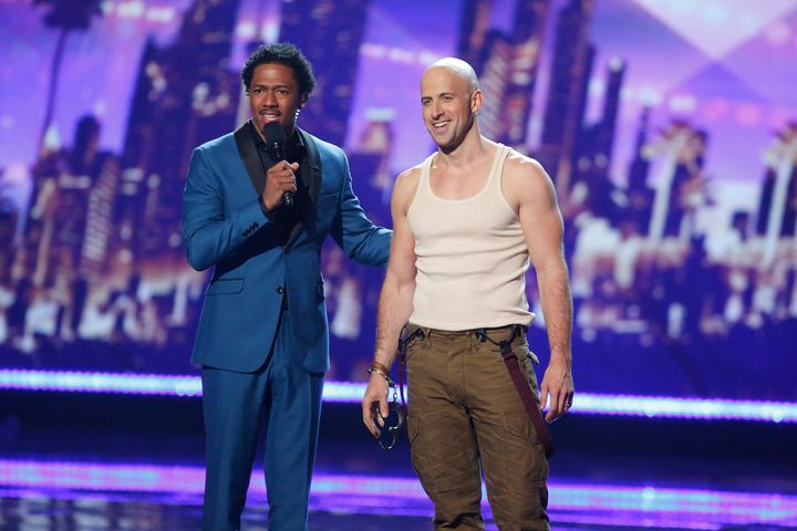 Illusionist Jonathan Goodwin pictured with AGT host Nick Cannon at last year's semi-finals. 