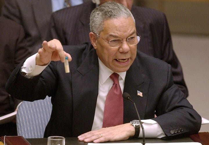 Then-Secretary of State Colin Powell holds up a vial he said could contain anthrax as he presents evidence of Iraq's alleged weapons programs to the United Nations Security Council in 2003.