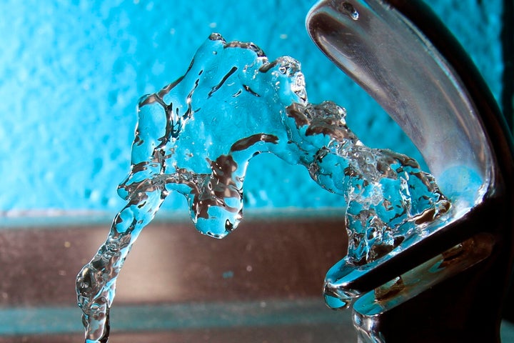 Water flows from a water fountain at the Boys and Girls Club in Concord, N.H. in this file photo. The state advanced several bills in 2020 to address concerns about contamination in the state's drinking water from a class of toxic chemicals known collectively as PFAS. (AP Photo/Jim Cole, File)