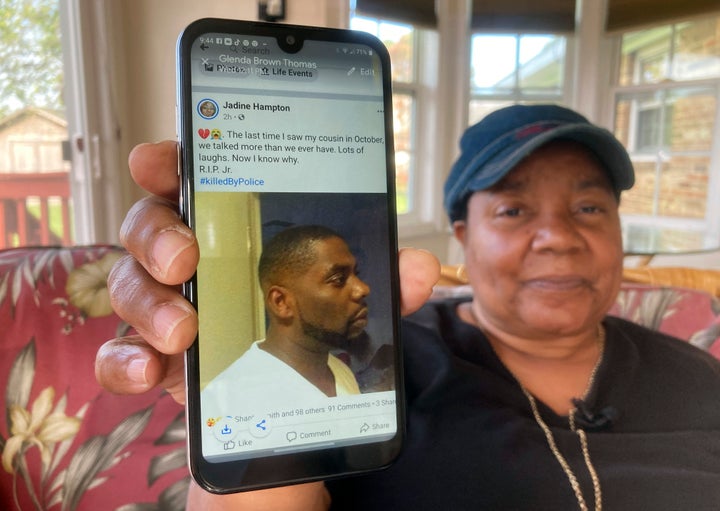 Glenda Brown Thomas displays a photo of her nephew, Andrew Brown Jr., at her home in Elizabeth City, North Carolina, on April 22. Brown was shot and killed by a sheriff's deputy who was attempting to execute a warrant.