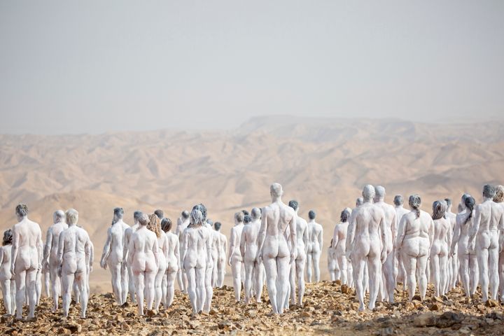 People pose nude for American artist Spencer Tunick as part of an installation in the desert near the Dead Sea, in Arad, Israel, designed to draw world attention to the importance of preserving and restoring the Dead Sea. (AP Photo/Ariel Schalit)