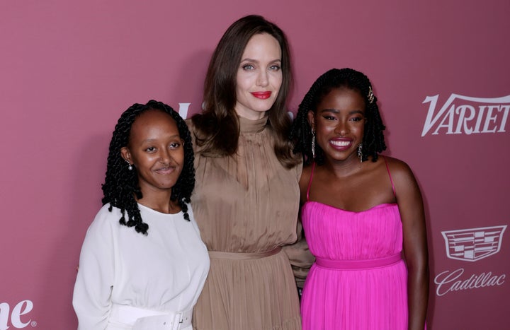 Zahara Jolie-Pitt, Angelina Jolie and Amanda Gorman at Variety's "Power of Women" event in September.