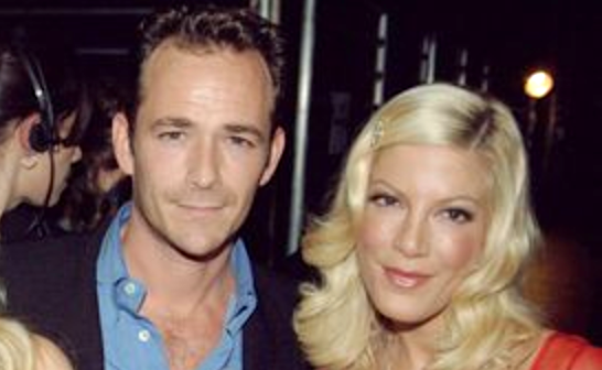 Luke Perry and Tori Spelling in an undated photo.