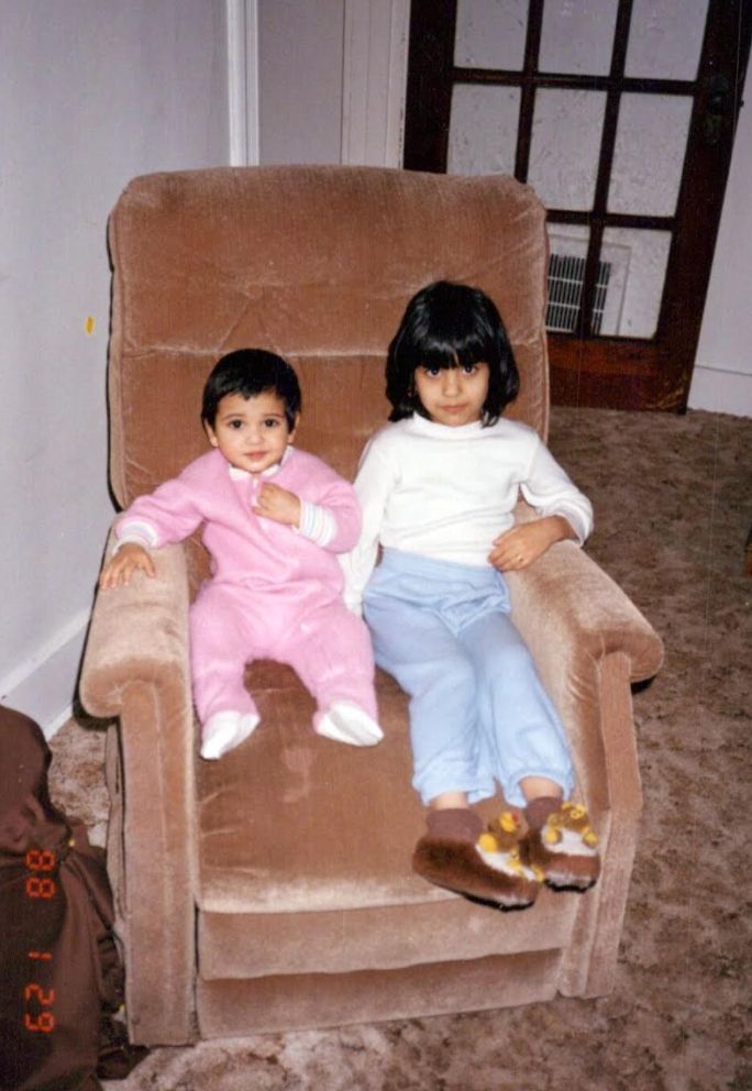 The author as a child, bundled up in warm PJs on a recliner next to her brother on a typically cold Pennsylvania day.