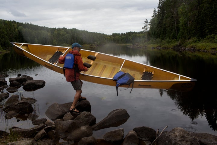 Outdoor enthusiasts travel by canoe through several of the hundreds of freshwater lakes that make up the Boundary Waters in September 2019 in the northern woods of Minnesota.