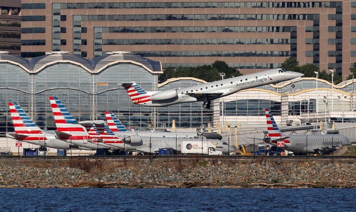 An American Eagle commuter jet takes off at Washington National Airport in Arlington, Virginia.