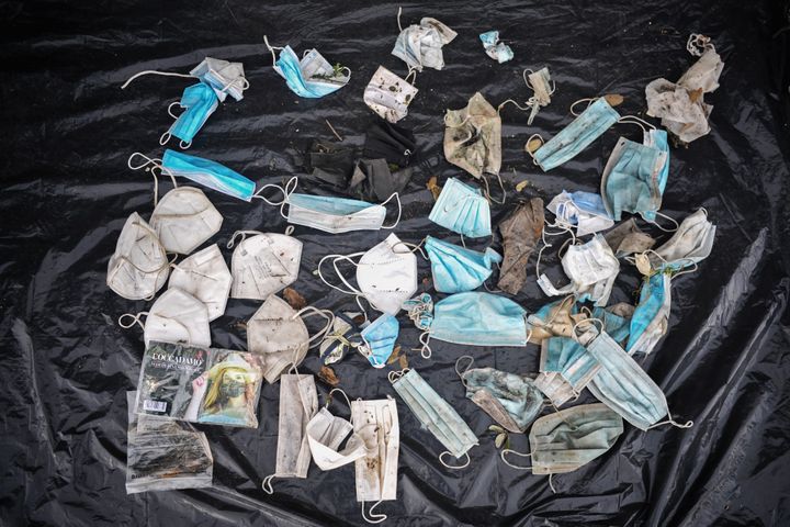 Tossed away masks to guard against COVID-19 found littering a harbor in Italy.