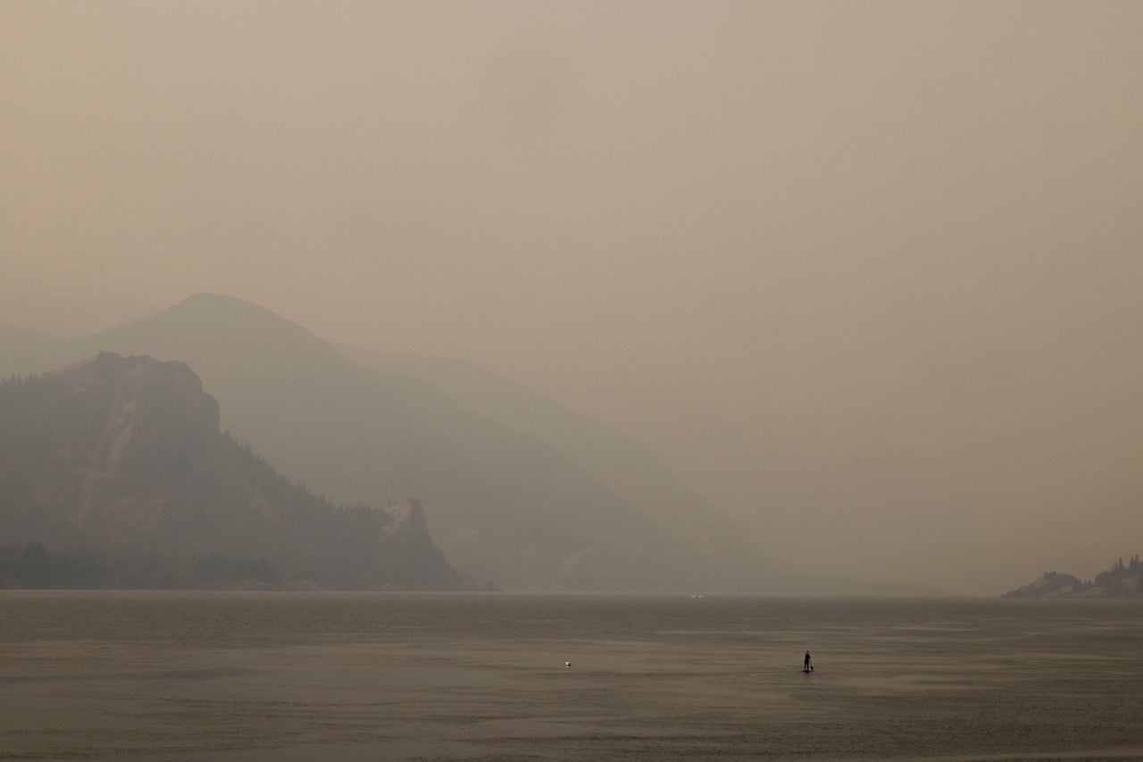 A lone paddleboarder on the Columbia River in Oregon during an abnormal heat wave in the Pacific Northwest on Aug. 13.