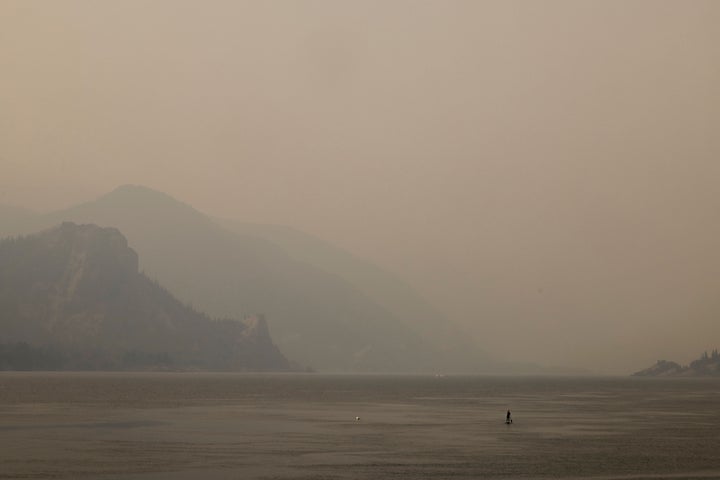 A lone paddleboarder on the Columbia River in Oregon during an abnormal heat wave in the Pacific Northwest on Aug. 13.