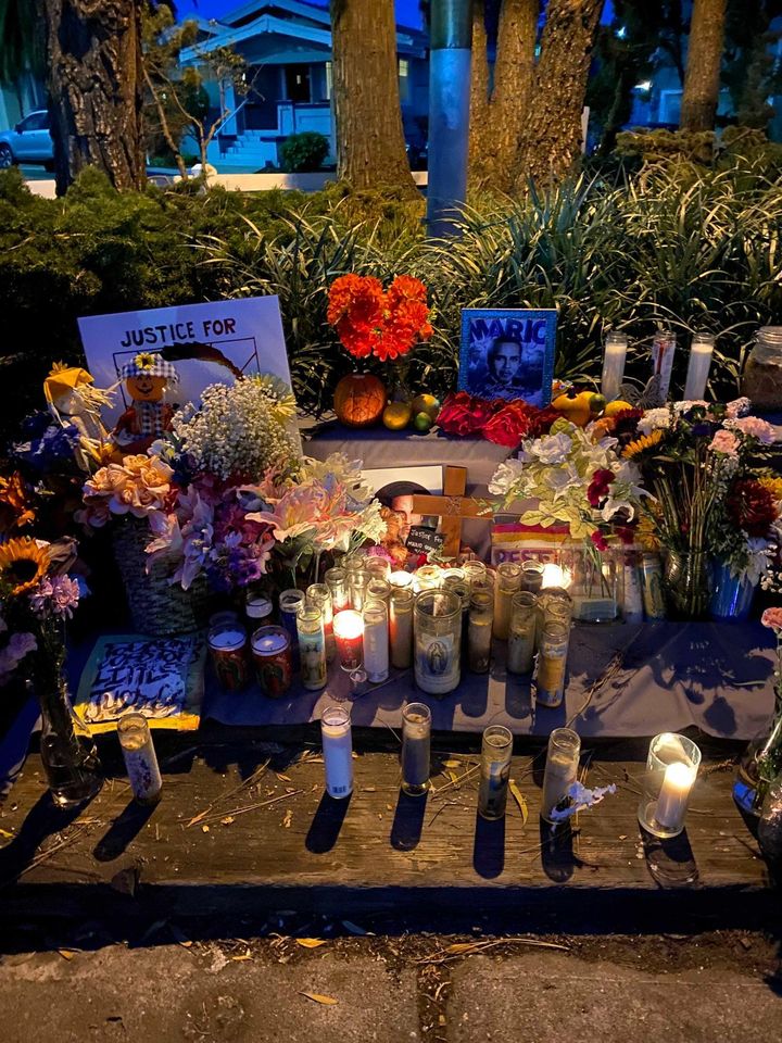 A vigil with photos and candles at the park where Mario Gonzalez died at the hands of police.