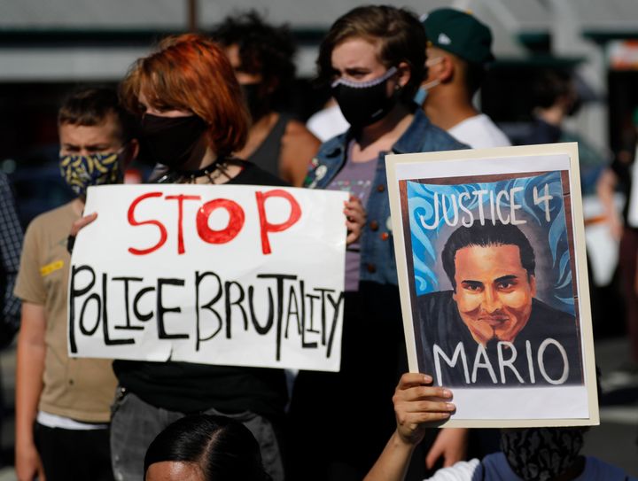 People attend a rally for Mario Gonzalez outside the Alameda Police Department Headquarters on May 3, 2021 in Alameda, Calif.